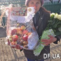 Fruit basket and white roses