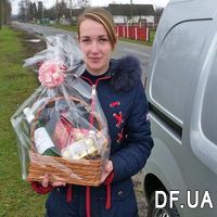 Basket of sweets with wine