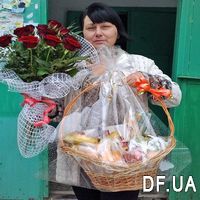 Gift basket and a bouquet of red roses