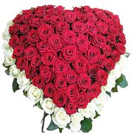A bouquet of roses in the shape of a heart