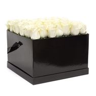White roses in a box