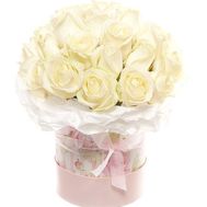 White roses in a box with a bow