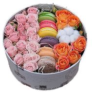 Flowers and macaroons in a box