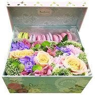 Flowers in a box with macaroni