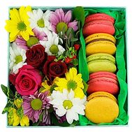 Flowers in a box with macaroons