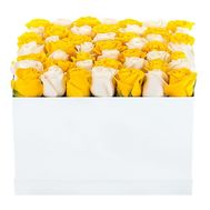 Box of white and yellow roses