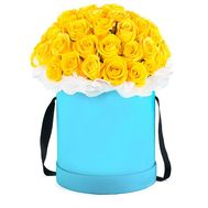 Beautiful yellow roses in a box