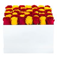 Red and yellow roses in a box