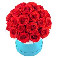 Red roses in a round box