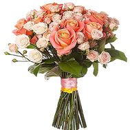 Shrubs cream-colored roses and ordinary roses