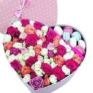 Macaroons in a box of flowers