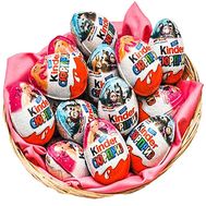 Eggs kinder surprise in the basket