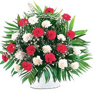 Bouquet of carnations in a basket