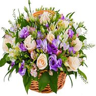 Flower basket from alstroemerias, roses and caucasus