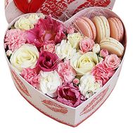 Flowers and macaroons in a box to buy