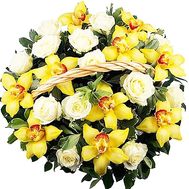 Basket of orchids and roses