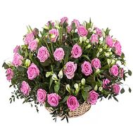 Basket of pink roses and alstroemerias