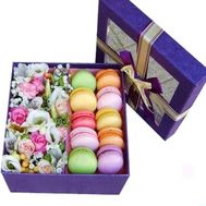 Gift box of macaroons and flowers