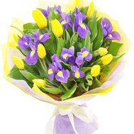 Yellow tulips and blue irises