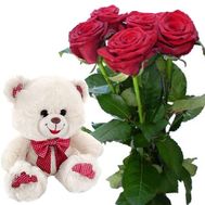 Bouquet of flowers and a bear