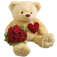 Bouquet of roses and a bear