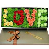 Composition from flowers - inscription LOVE