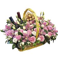 Basket of flowers, sweets and wine