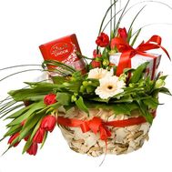 Basket with flowers and sweets