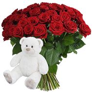 Teddy bear with red roses