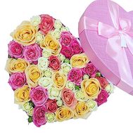 A bouquet of roses in a box