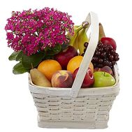 Flowers and a basket of fruit