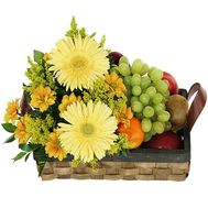 Flowers and a basket of fruit