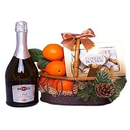Champagne, tangerines and sweets in the basket