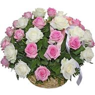 White and pink roses in a basket