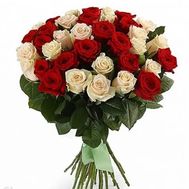 Bouquet of red and cream roses