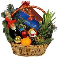 Candy, champagne, fruit in a basket