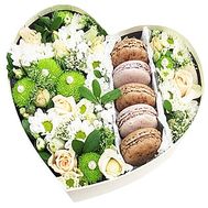 Box with flowers and macaroons