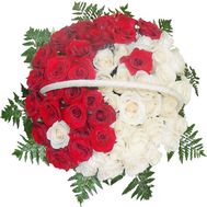 Red and white roses in a basket