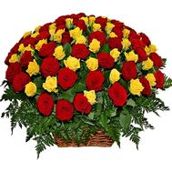 Red and yellow roses in a basket