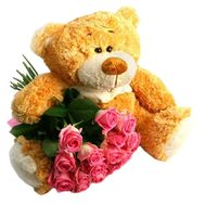 Bear and bouquet of roses