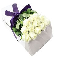 White roses in a long box