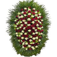 Funeral wreath of white and red roses