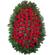 Funeral wreath of roses and thuja