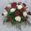Beautiful red and white roses in a basket - view 1