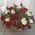 Beautiful red and white roses in a basket - view 2