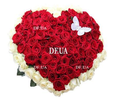Bouquet of red and white roses in the form of heart