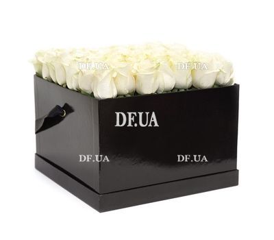 White roses in a box