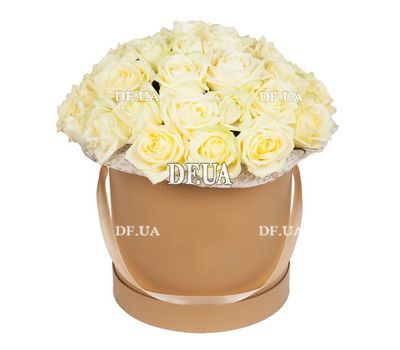 White roses in a round box