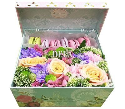 Flowers in a box with macaroni