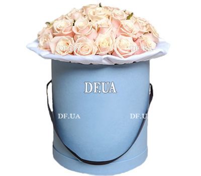 Beautiful creamy roses in a round box